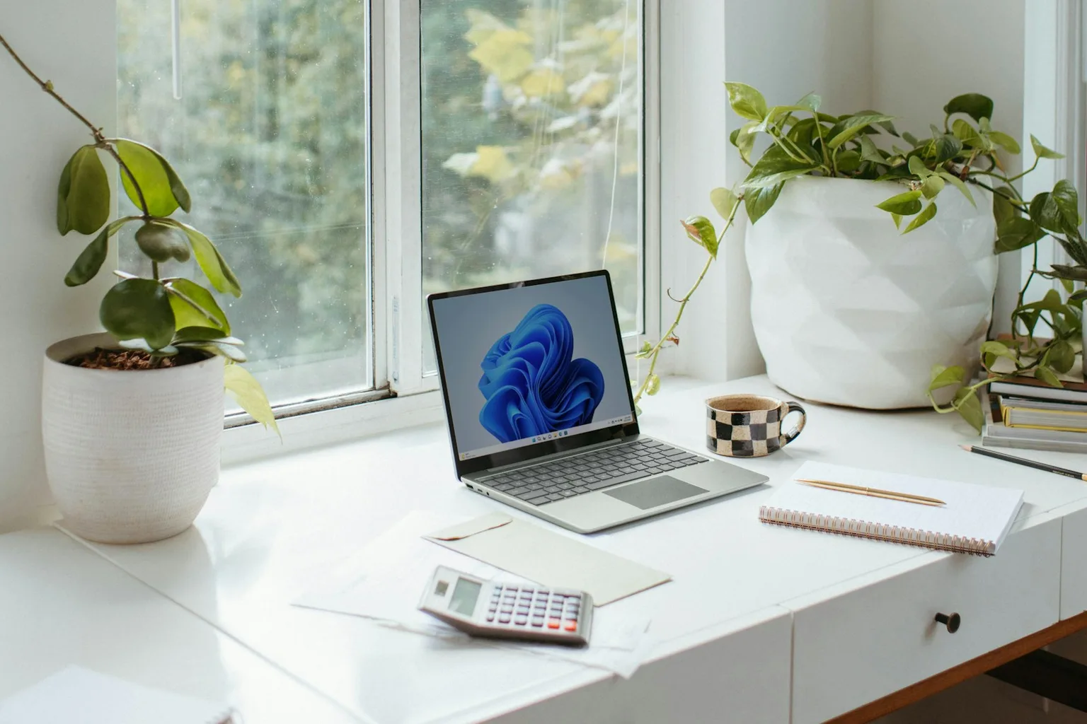 Business laptop on an office desk available for rent from Rentech